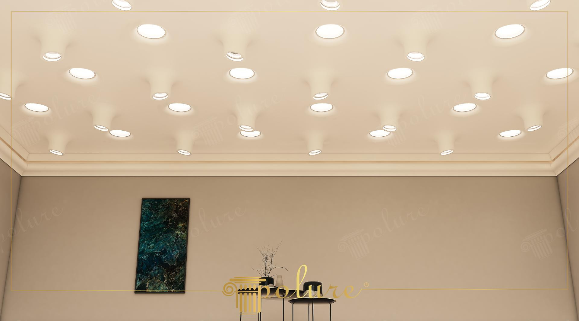Krem rengi tavan zemininde dairesel formlarda konumlandırılmış P81376, PA501 ve PA502 modeli poliüretan armatür kasaları ve içlerine entegre edilmiş modern spot aydınlatmalar.